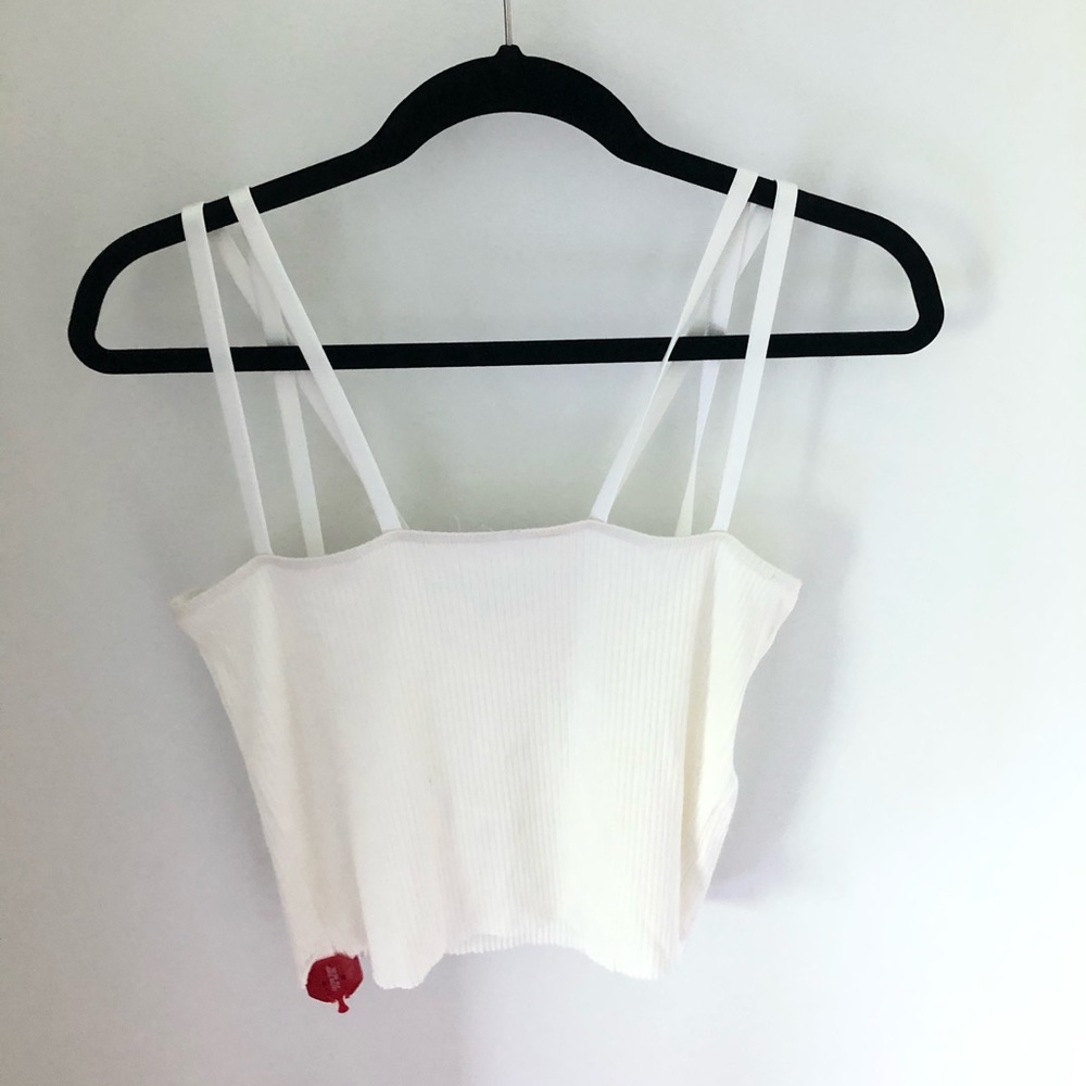 White ripped tank top from The Range